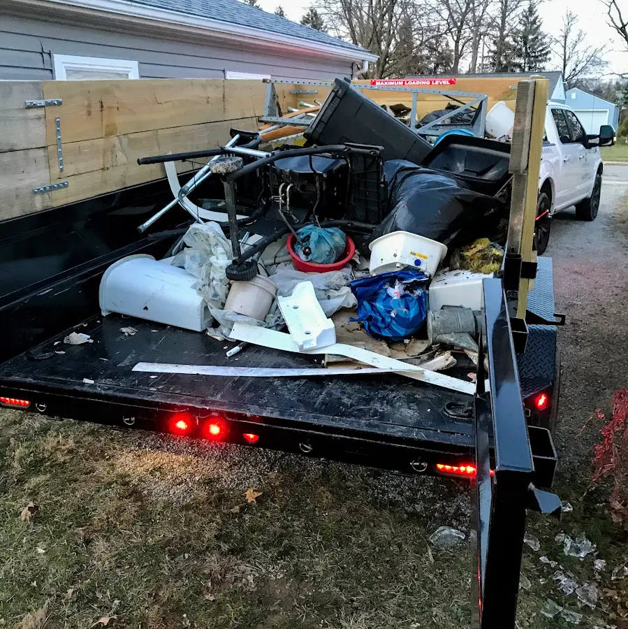 Roll-off dumpster delivered to a residential driveway in Long Prairie